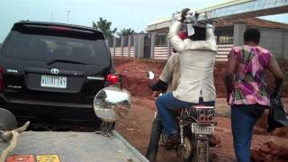 Nigeria....what can a Nigerian carry on a motorbike ?....ANYTHING
