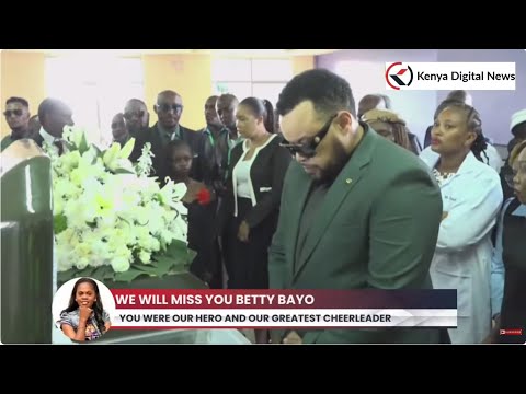 Kanyari, Betty Bayo's husband Tash and the children view Betty Bayo's body ahead of burial