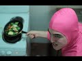 PINK GUY COOKS STIR FRY AND RAPS 