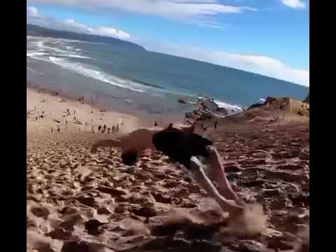 GUY DOES BACKFLIPS DOWN A SAND HILL | 🙄🙄🙄