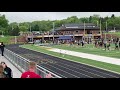 400 m  49.90 Oakland County Championship- Lane 2 red shorts, white and grey tank.