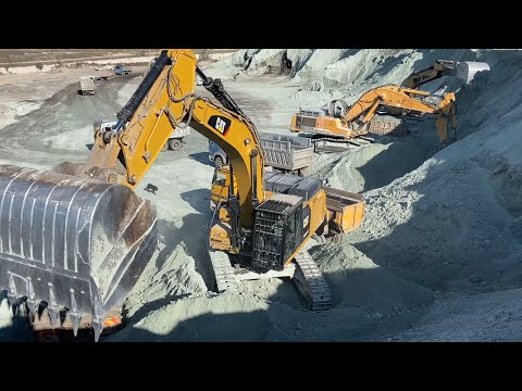 Caterpillar 352F - Liebherr 974 And Caterpillar 385C Excavators Loading Trucks