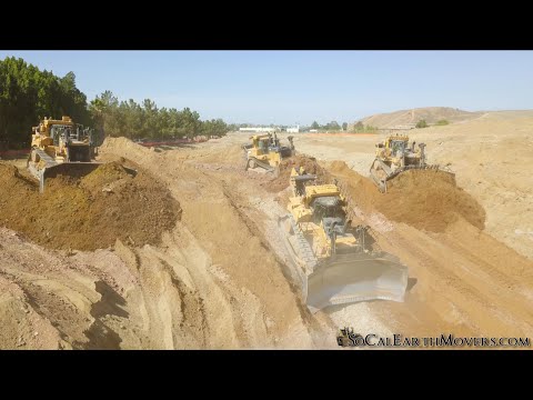 Serious Horsepower - A D10T and three D11T dozers grading for new building pad
