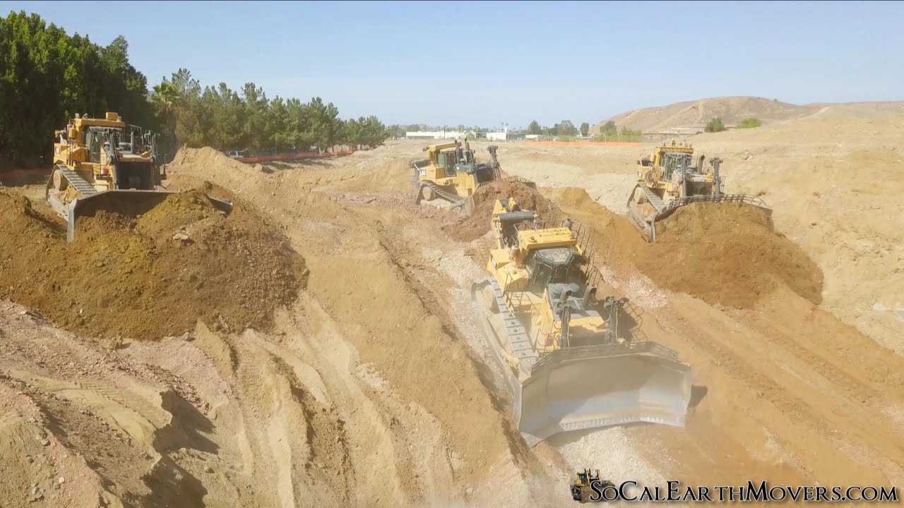 Serious Horsepower – A D10T and three D11T dozers grading for new building pad