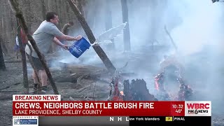 Crews, neighbors battle brush fire in Shelby County