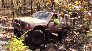 preview picture of video 'Jeep Cherokee XJ Rock Climbing a Red & Black Trail'
