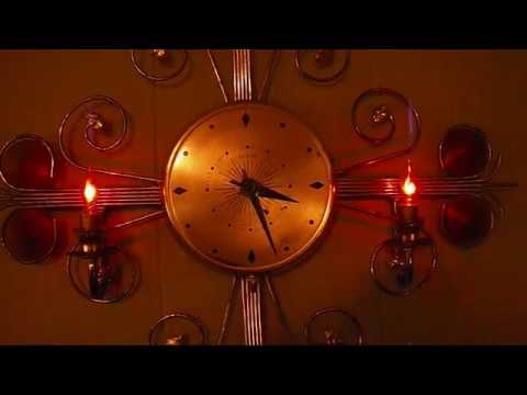 1960s UNITED Starburst/Sunburst Lighted Clock with Flicker Flame Bulbs