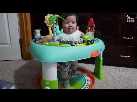 Emme observes her new Infantino 3-in1 Spin & Stand Entertainer, baby activity table