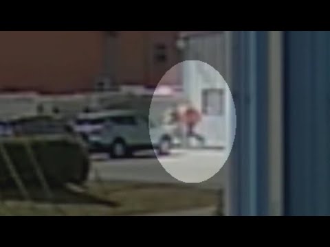 Neighboring business captures workers fleeing shooter on security camera