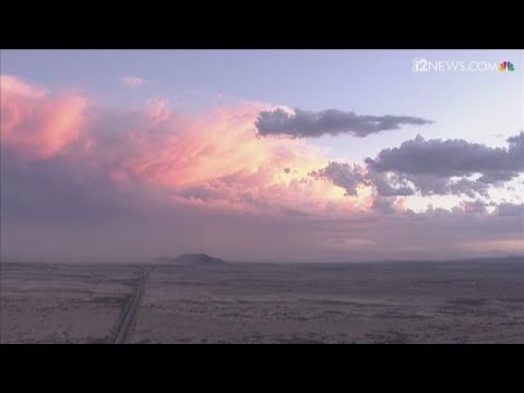 A dust storm moves in at sunset