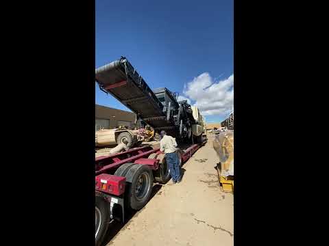 Loading a Rock Crusher - HeavyHaulers.com