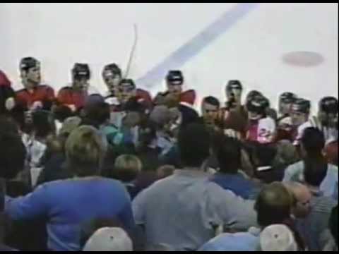 Sasha Lakovich defends Guy LaPointe & goes over the glass Calgary Flames