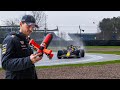 FPV drone following the RB20 with Max Verstappen for a full lap at Silverstone