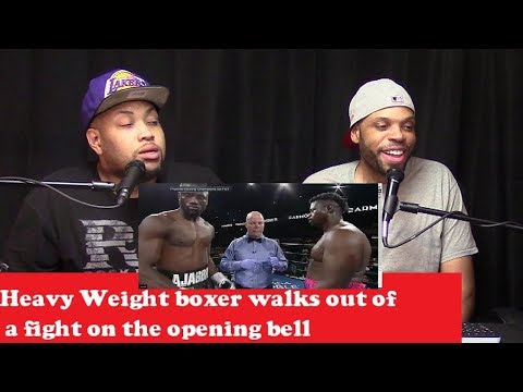 Heavy weight boxer walks out of the ring during a match