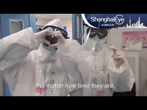 Casal de médicos brigando na linha de frente em Wuhan