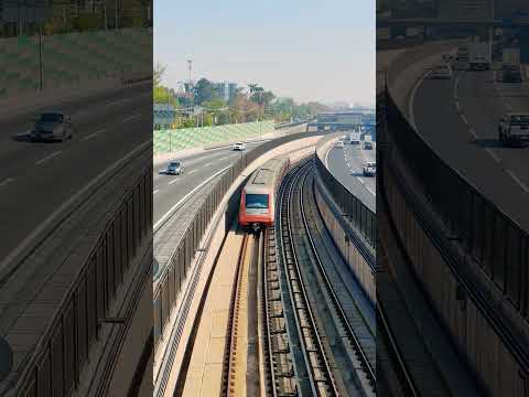 Metro de Santiago Línea 4A (AS02) saliendo en dirección a Estación La Granja