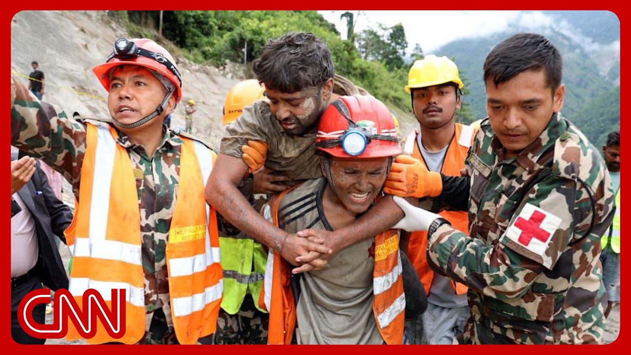 2 pulled alive from flooded Nepal tunnels, sparking hope for more rescues
