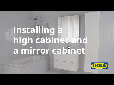Part of a video titled Installing a high cabinet and a mirror cabinet - IKEA - YouTube