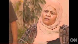 Enraged mother stands by daughter, allegedly raped by Gadhafi's men