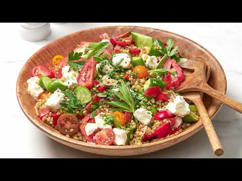Craving something healthy and delicious? Try our Greek grain salad recipe! 🥗💚