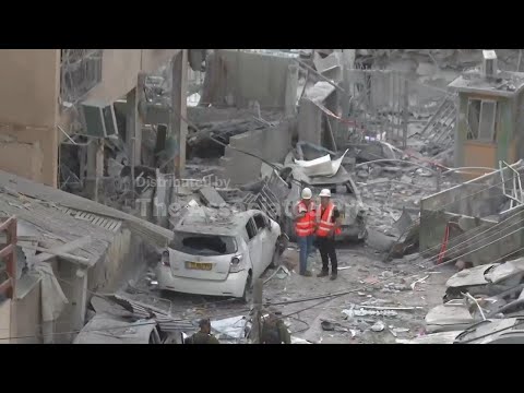 Buildings and vehicles damaged in aftermath of Iranian strike in Bnei Brak, Israel