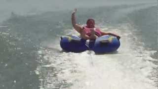 preview picture of video 'Lisa tubing on Big Arbor Vitae Lake, Wisconsin #6 - July 5, 2012'