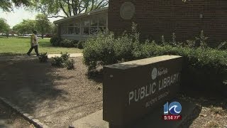 Residents say drug dealers are using library as selling spot