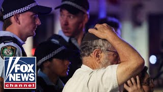 BREAKING: At least 12 dead in Australia after Hanukkah event shooting