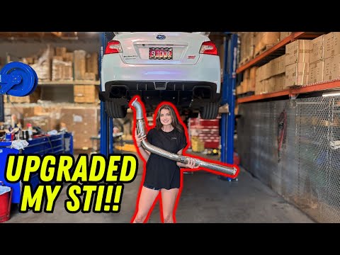 INSTALLING MY INVIDIA HIGH FLOW CATTED DOWNPIPE ON MY STI!!