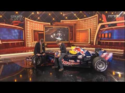 Vettel almost runs over audience during donut