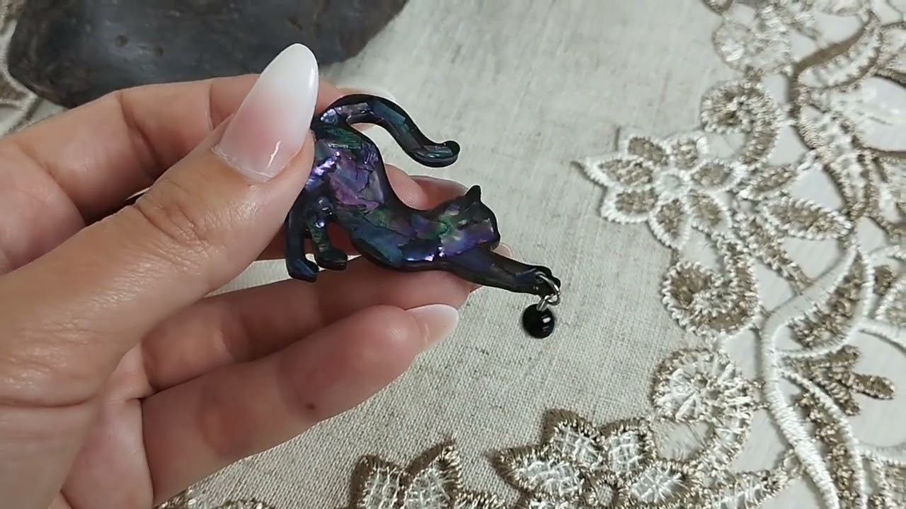 Black cat brooch with mother of pearl. Handmade resin brooch. Shell rock brooch
