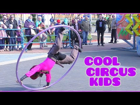 Aralova Kira (10 years old) - Acrobat on the Cyr Wheel. "The Adventures of a Cool Cowboy"
