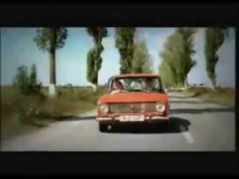 Old Couple Driving with two steering wheels