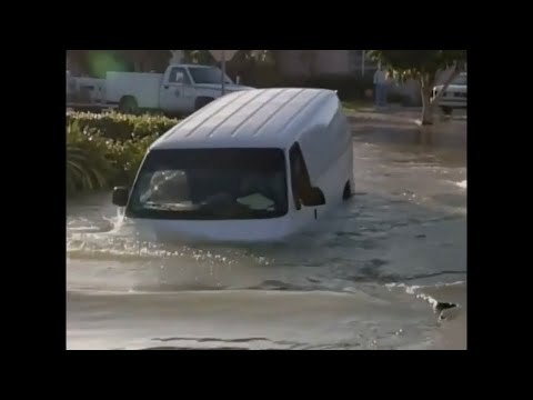 Man Drives Van Into Sinkhole