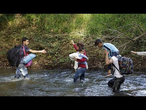 Refugee path through Slovenia under threat as train traffic cut with Croatia