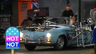 Brad Pitt Driving A Classic Convertible, Filming Once Upon A Time In Hollywood