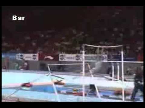 Uneven bars. Dismount salto bwd with 3/1twist (E)