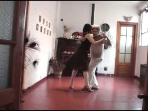  Alberto Dassieu  and  Eva Garlez  are  dancing  to  the  tango  "  A Evaristo Carriego  "