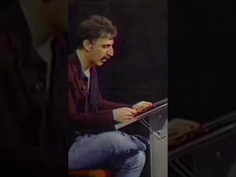 FZ reading from the Barking Pumpkin vinyl PSA on CBS Night Watch.