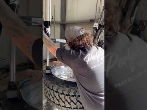 AJ mounting 24x14 American Force Nemesis wheels on 33x14.50x24 Fury tires. Ford Ram Duramax Cummins
