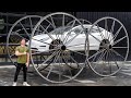 Driving A Tesla Upside Down 10ft Tall Wheels