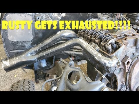 Modifying a set of fender exit headers