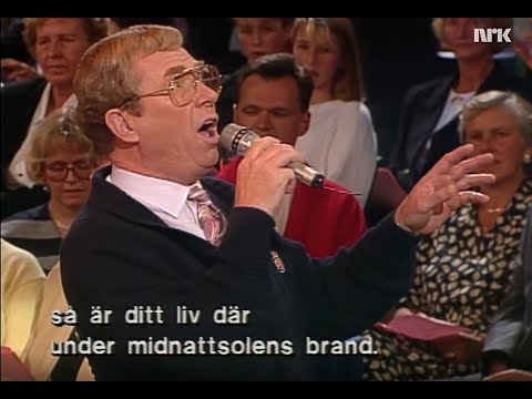 Ray  Adams sjunger "De tusen sjöars land"(Suomi)