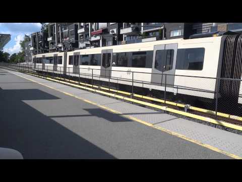 Oslo T-Bane Line 1 train arriving & departing Holmenkollen