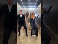 Luke Evans, Olly Murs, Beverley Knight, Nicole Scherzinger and Leean Rimes dance in an elevator.