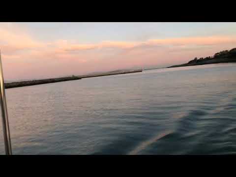 Scow bow junk rig Rosie G leaving BMC - going 6 knots half throttle - no wake!