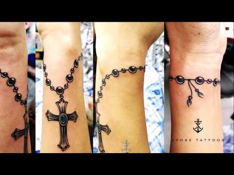 download lagu mp3 mp4 Tattoo Rosary Hand, download lagu Tattoo Rosary Hand gratis, unduh video klip Tattoo Rosary Hand