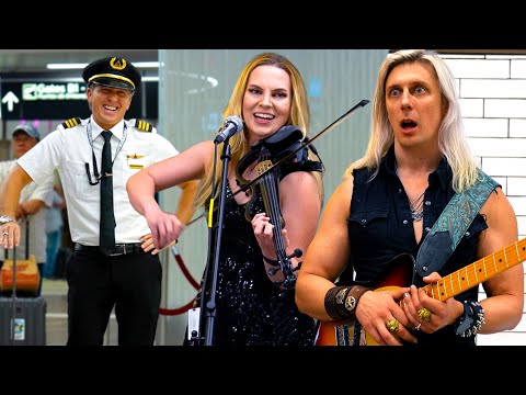 Pilot Requests Devil Went Down To Georgia and This Violinist Shocks The Airport Crowd 
