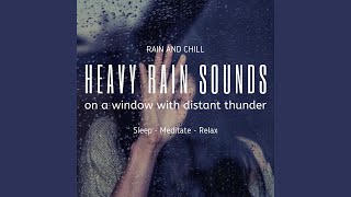 Heavy Rain Sounds on a Window with Distant Thunder