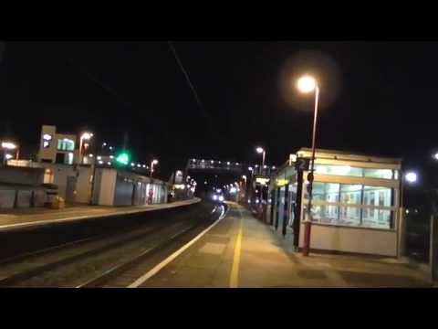 Class 70015 passes Runcorn on a liner